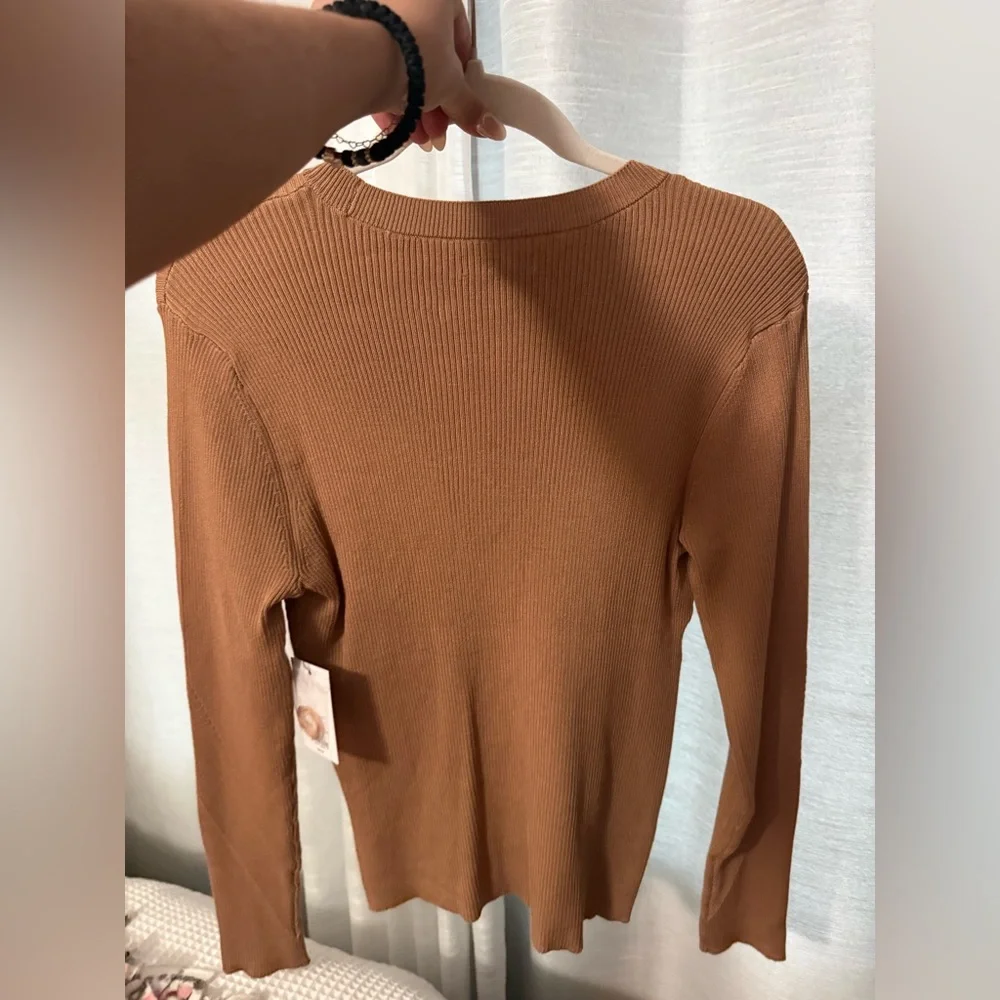 Nine West Tan Ribbed Sweater
Brand new with tags!
Size Large - Picture 8 of 9